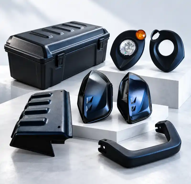 Moulded FRP parts: tool box, lamp housings, cowls and a grab handle